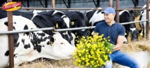 Canadian dairy farmer delivering fresh milk to a local business